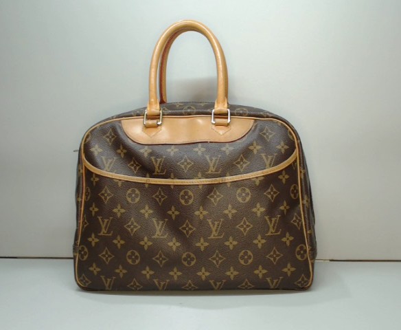 Deauville leather handbag Louis Vuitton Brown in Leather - 35881139